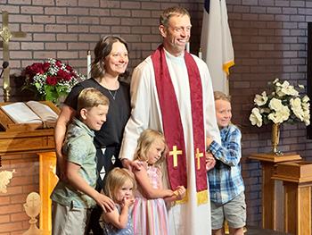 Rev. John Raasch pictured above